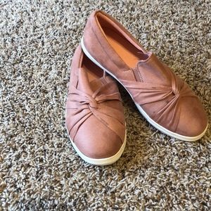 Pink slip on sneakers